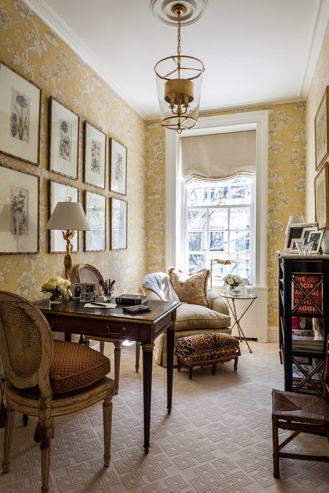 Inspiration for a small traditional study room in New York with multi-coloured walls, carpet and a freestanding desk.