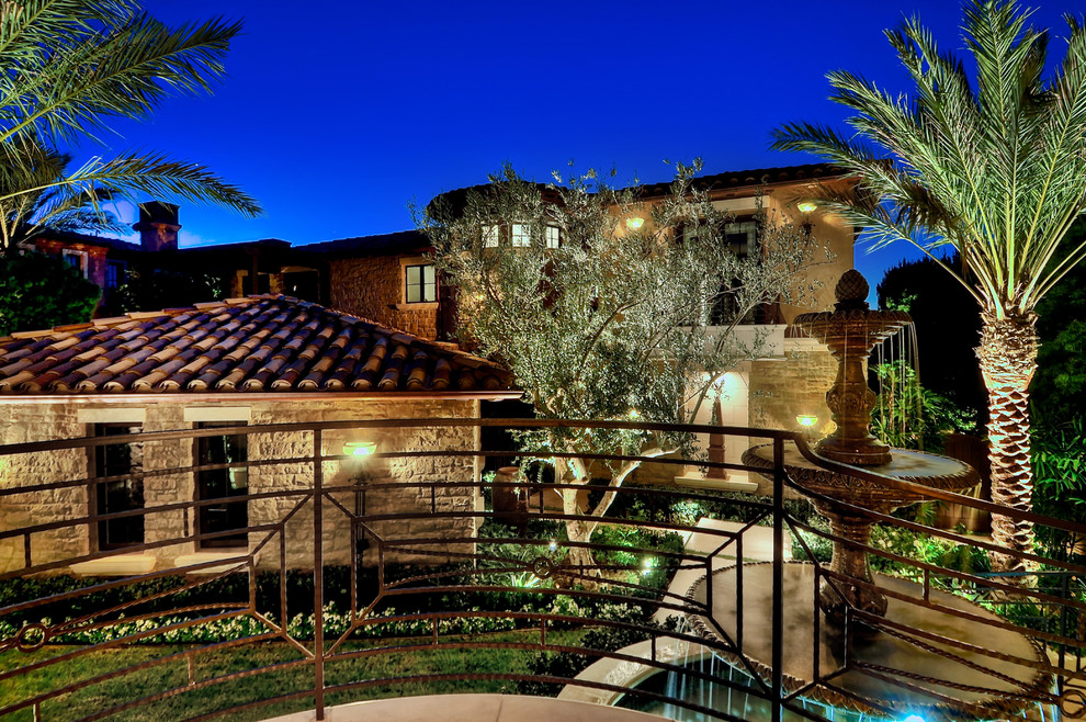 Example of a tuscan home design design in Orange County