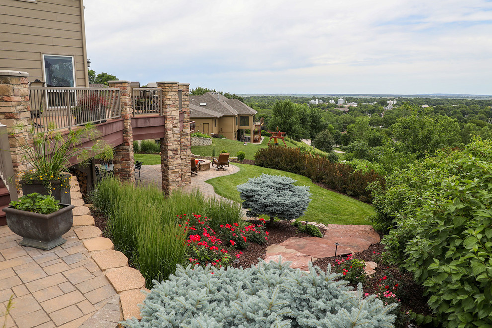 Nestled Retreat Traditional Landscape Omaha by Watkins Concrete