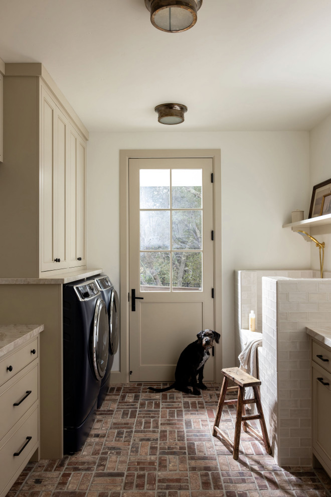 Transitional laundry room photo in Sacramento