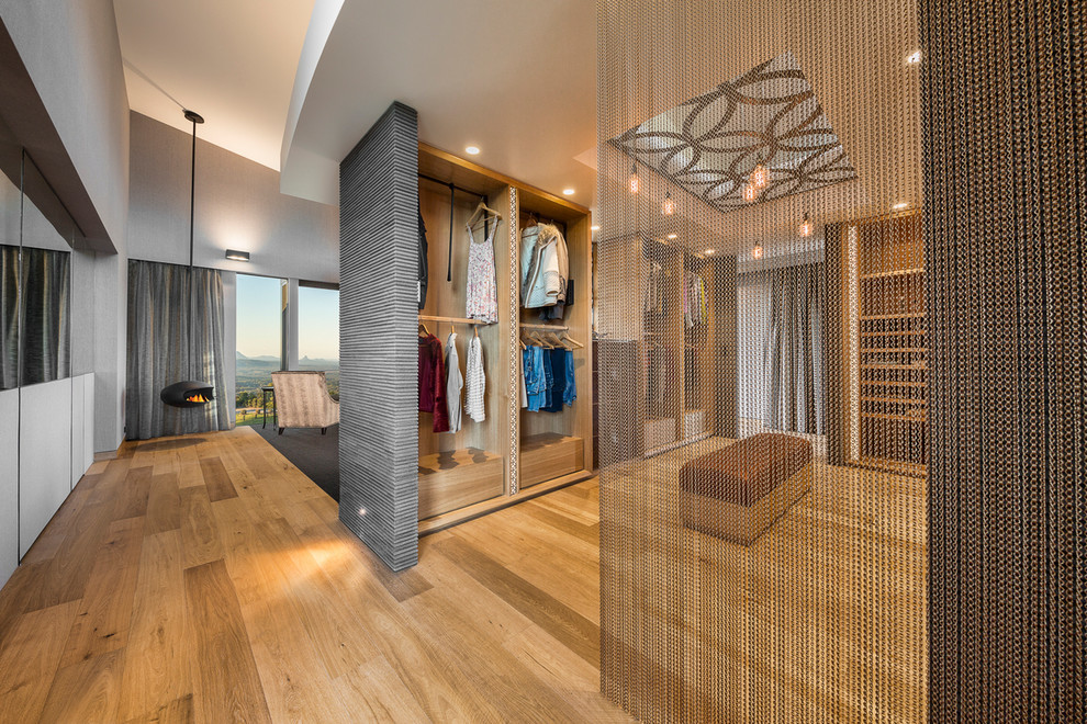 Design ideas for an expansive contemporary dressing room in Brisbane.