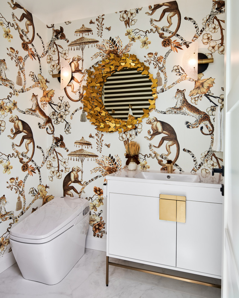 Inspiration for a mid-sized modern powder room in Atlanta with flat-panel cabinets, white cabinets, a one-piece toilet, porcelain floors, engineered quartz benchtops, white benchtops, a freestanding vanity and wallpaper.