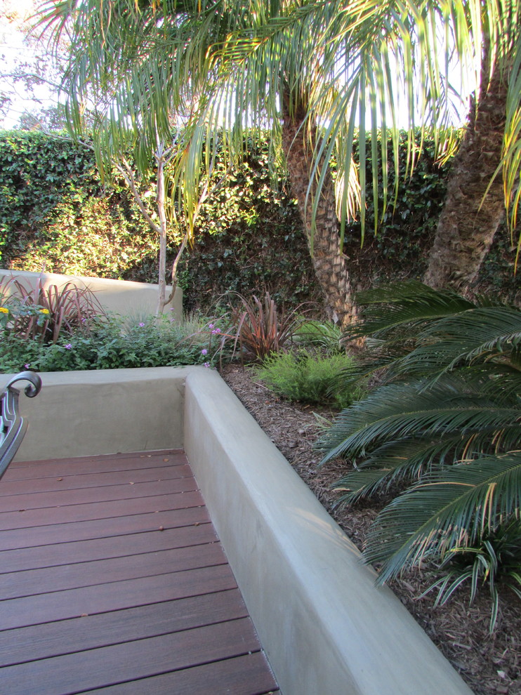 Example of an island style home design design in San Diego