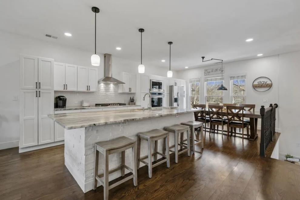 White kitchen with island seating