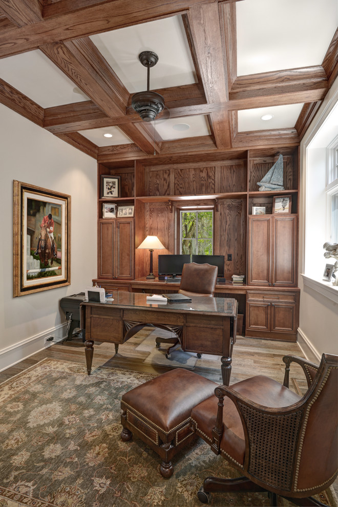 This is an example of an arts and crafts home office in Charleston.