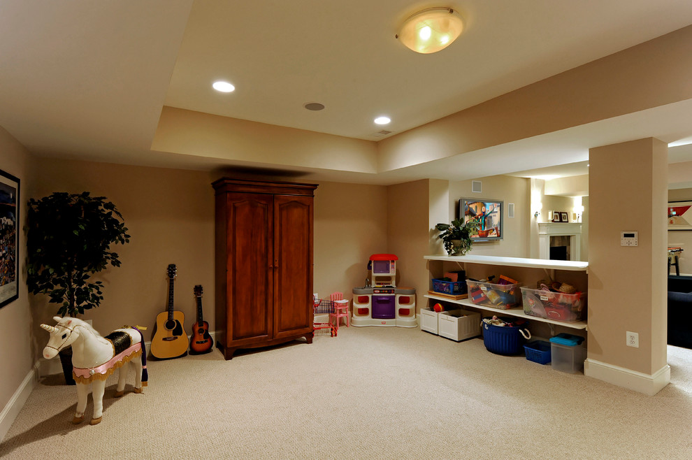Inspiration for a mid-sized transitional gender-neutral kids' playroom for kids 4-10 years old in DC Metro with carpet.