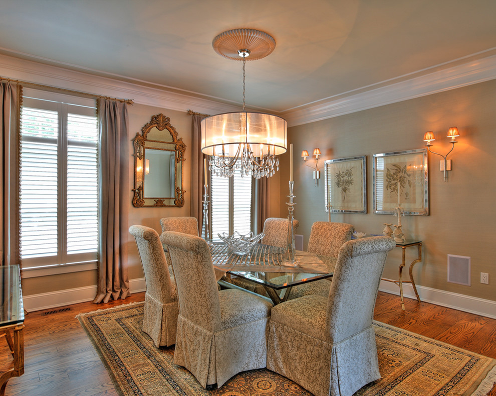 Mid-sized traditional separate dining room in New York with beige walls, medium hardwood floors and no fireplace.