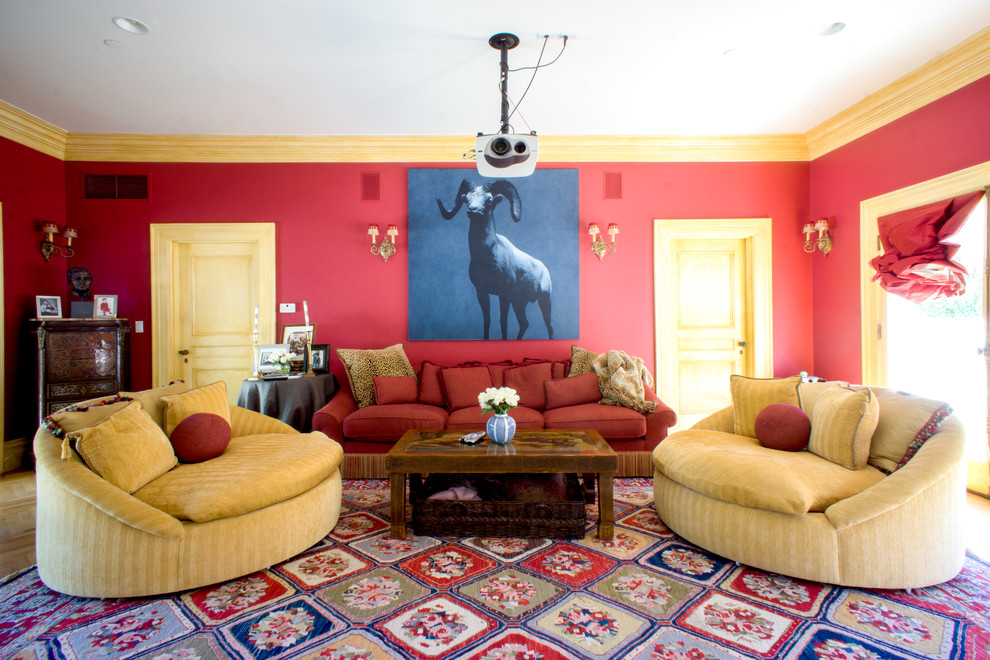 Inspiration for a traditional enclosed family room in San Francisco with red walls and no fireplace.