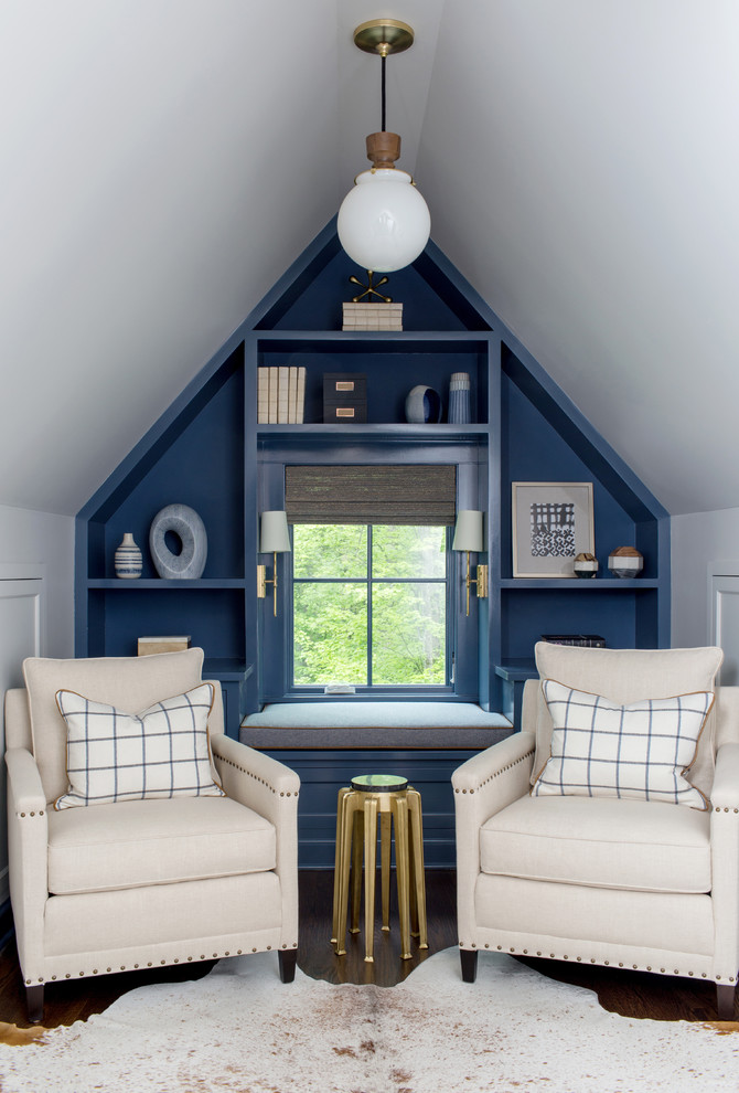Photo of a transitional home office in New York with blue walls, dark hardwood floors and brown floor.