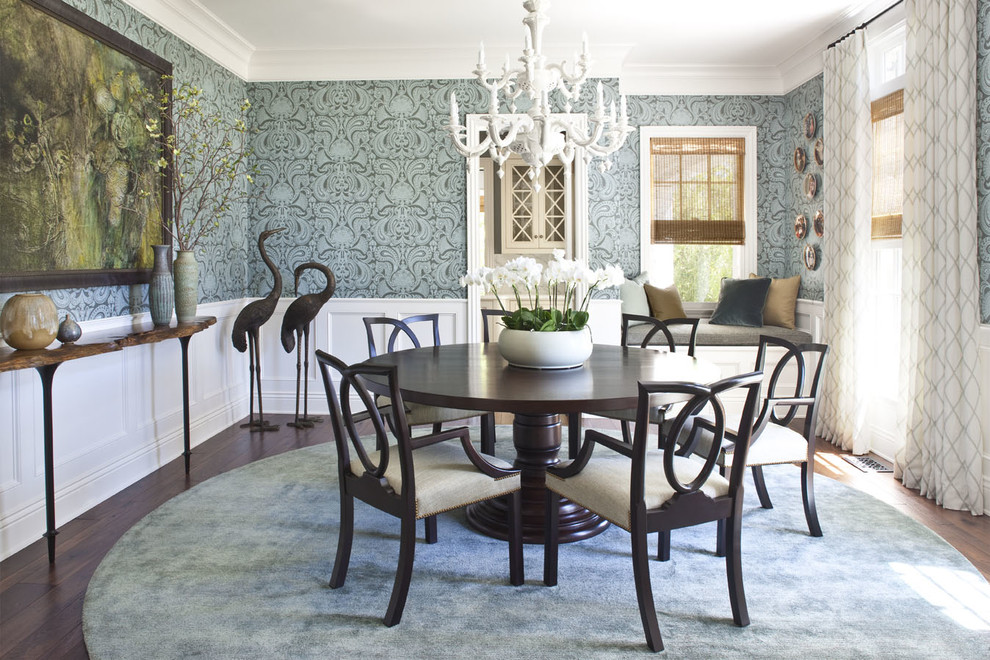 Inspiration for a traditional separate dining room in Los Angeles with blue walls and dark hardwood floors.