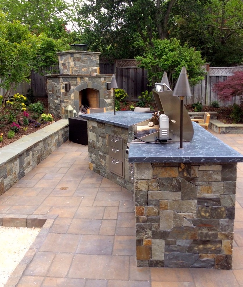 Design ideas for a mid-sized transitional backyard patio in San Francisco with an outdoor kitchen, concrete pavers and no cover.