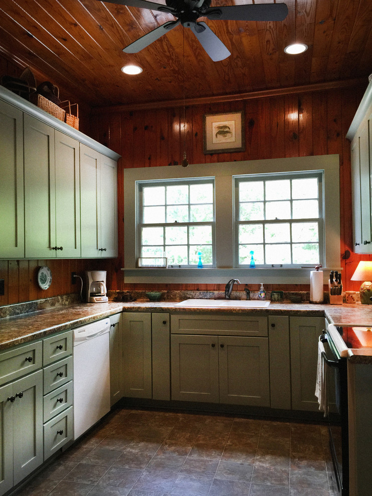 Small country u-shaped separate kitchen in Atlanta with a drop-in sink, shaker cabinets, green cabinets, laminate benchtops, brown splashback, white appliances, vinyl floors and no island.