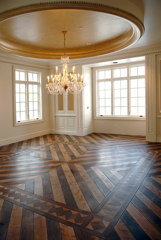 Large ornate medium tone wood floor, brown floor and tray ceiling great room photo in Chicago