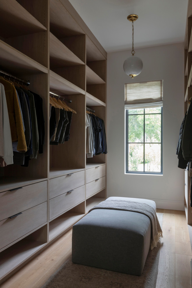 Transitional light wood floor and beige floor walk-in closet photo in San Francisco with open cabinets and light wood cabinets