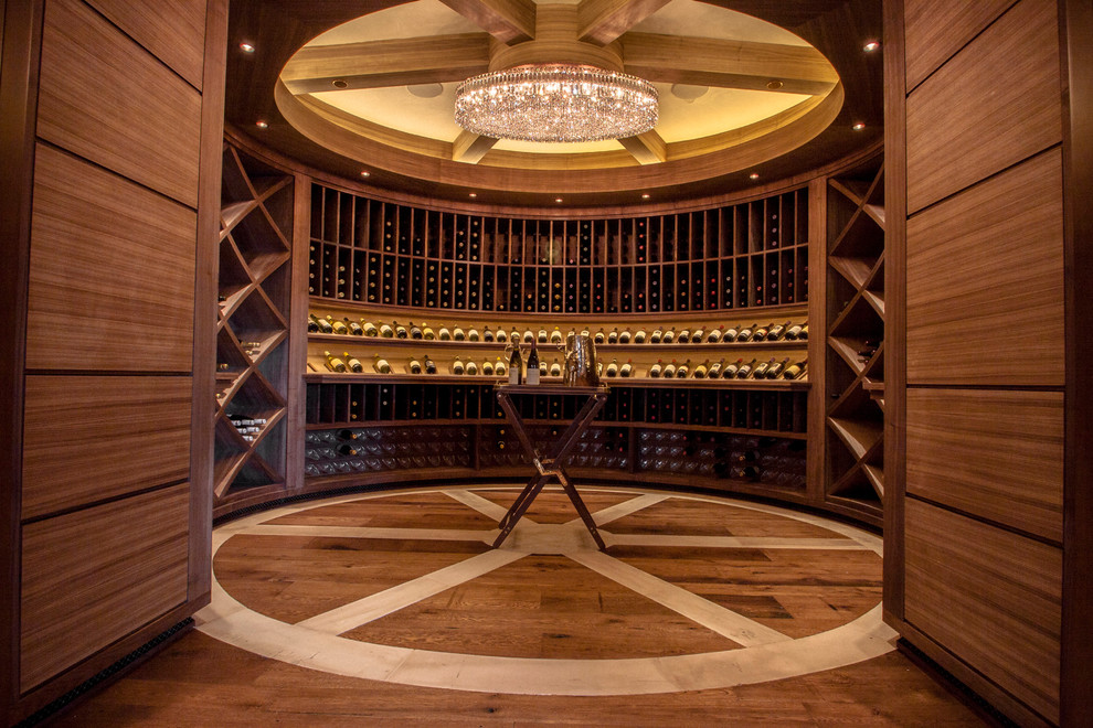 Design ideas for a traditional wine cellar in Denver with medium hardwood floors and storage racks.