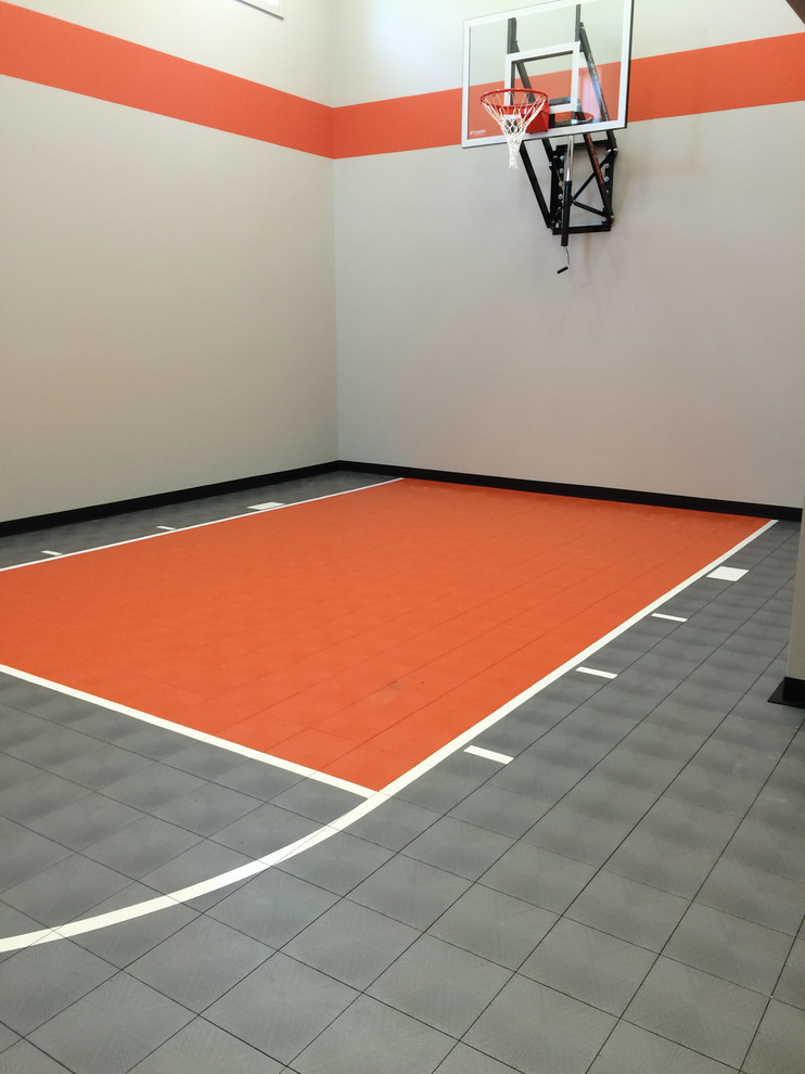 Design ideas for a mid-sized traditional indoor sport court in Minneapolis with orange walls.