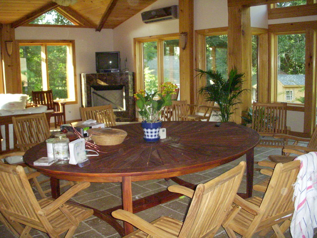 Example of a large arts and crafts formal and open concept ceramic floor living room design in Other with white walls and no tv