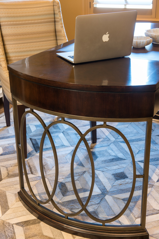Example of a mid-sized transitional freestanding desk medium tone wood floor home design design in Dallas with yellow walls