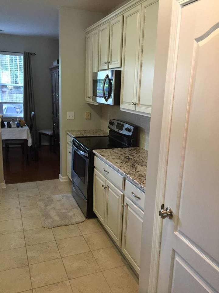Example of a transitional home design design in Charlotte