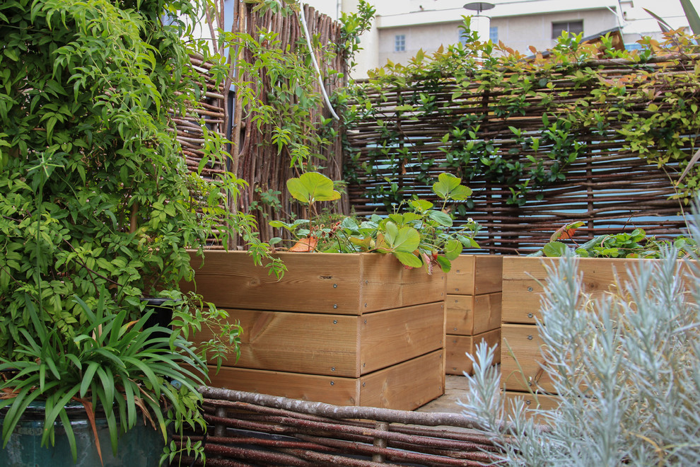 Design ideas for a large country rooftop deck in Paris with a container garden and no cover.