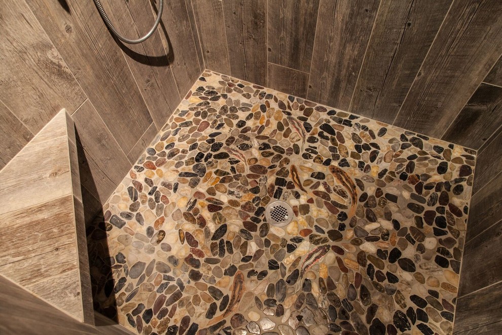 Inspiration for a mid-sized country master bathroom in Other with furniture-like cabinets, brown cabinets, a claw-foot tub, an alcove shower, beige walls, mosaic tile floors, a wall-mount sink, soapstone benchtops, white floor and a shower curtain.