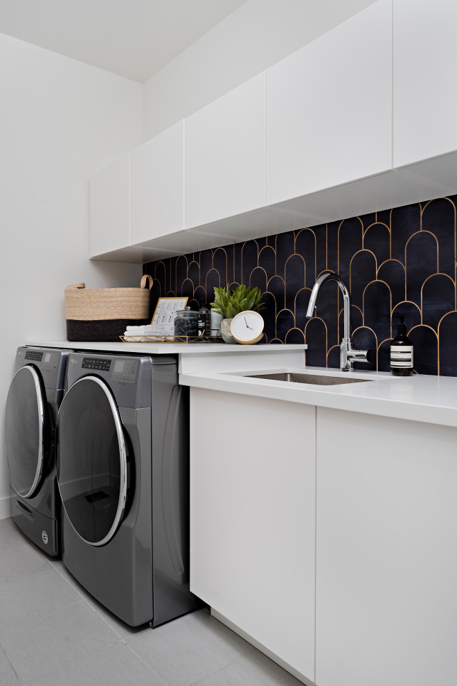 Small trendy single-wall dedicated laundry room photo in Toronto