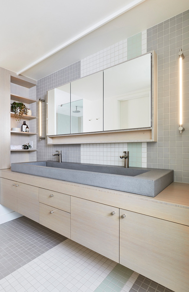 Inspiration for a mid-sized contemporary master bathroom in Portland with flat-panel cabinets, light wood cabinets, multi-coloured tile, mosaic tile, mosaic tile floors, a trough sink, wood benchtops, multi-coloured floor and beige benchtops.