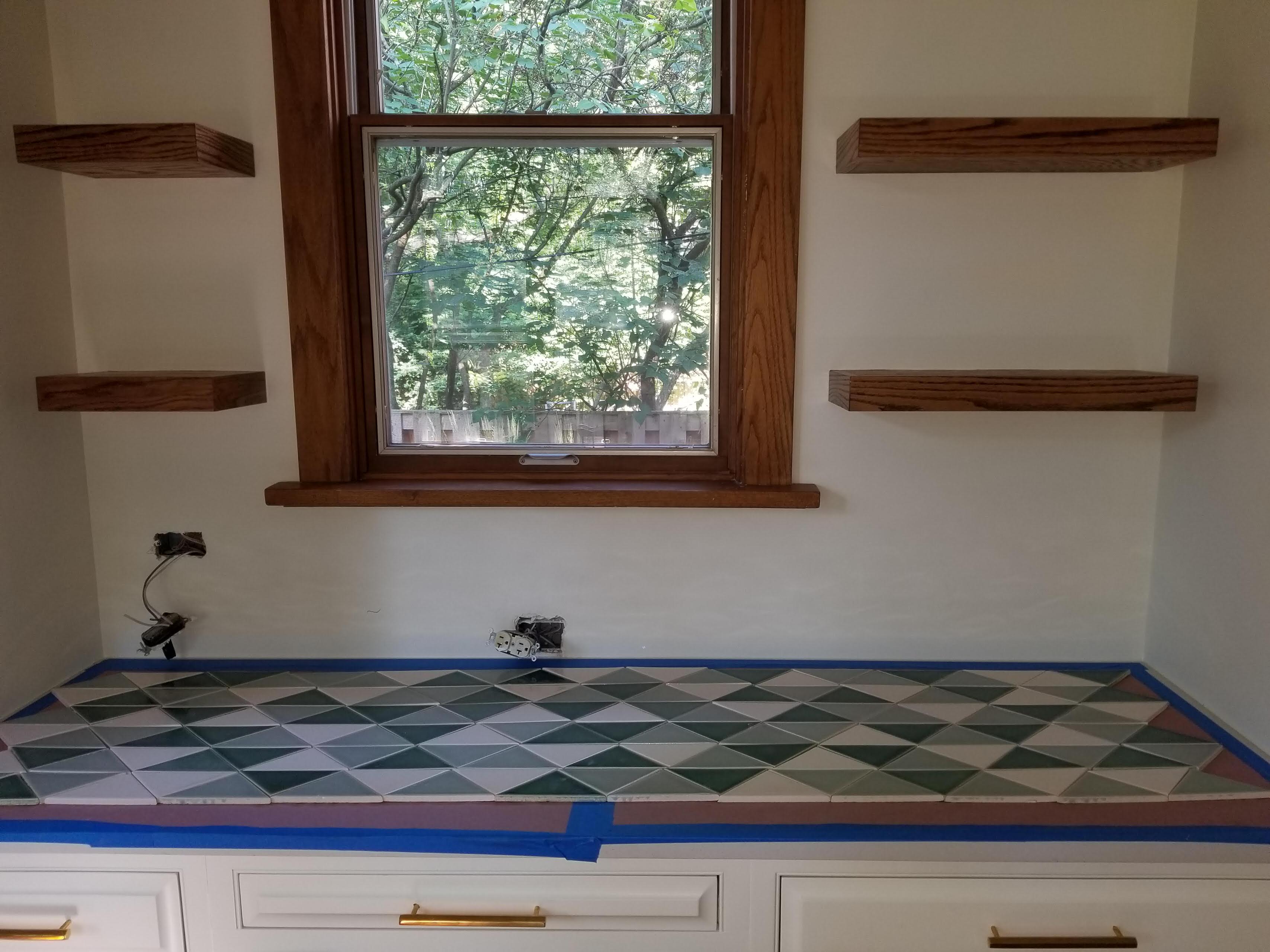 kitchen refinishing  , flooding  shelves  and backsplash