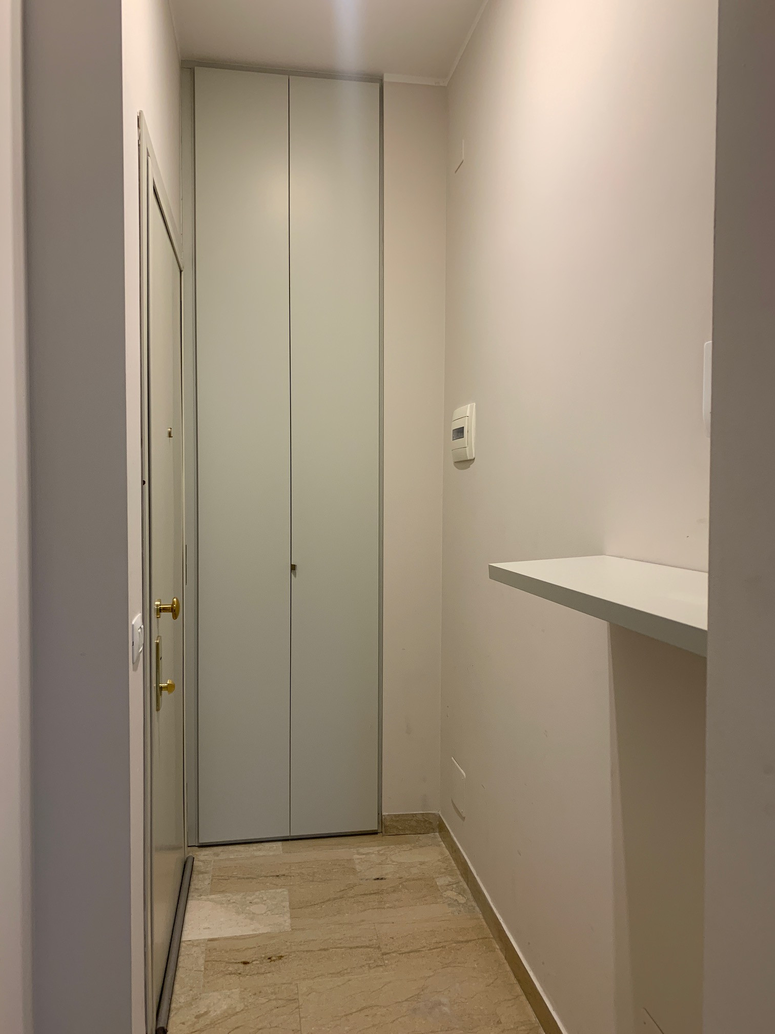 ingresso attrezzato per cappotti e scarpe