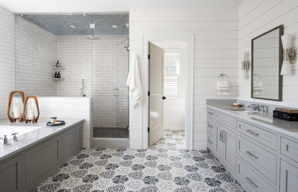 Inspiration for a large classic ensuite bathroom in Boston with beaded cabinets, grey cabinets, a built-in bath, a double shower, a one-piece toilet, white tiles, porcelain tiles, white walls, ceramic flooring, a built-in sink, soapstone worktops, black floors, a hinged door, grey worktops, an enclosed toilet, double sinks, a built in vanity unit and tongue and groove walls.