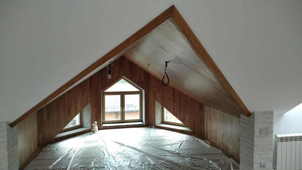 Отделка мансарды деревом