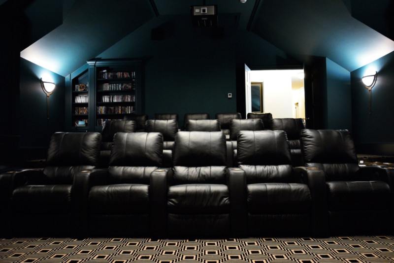 This is an example of a transitional home theatre in Houston.
