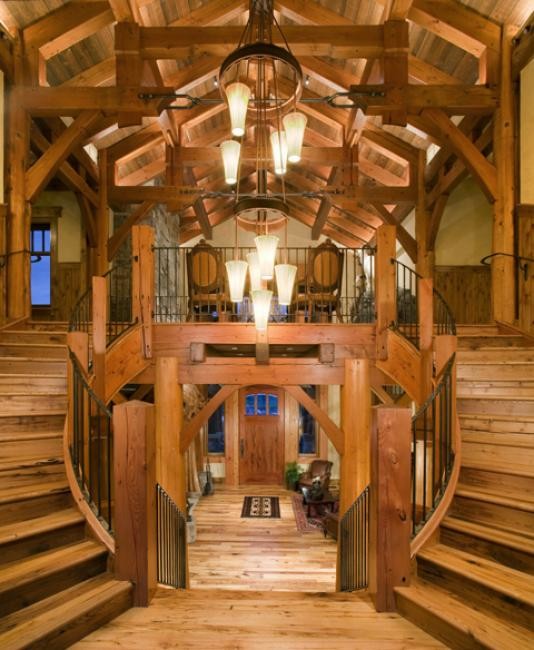 Staircase - large rustic wooden curved metal railing staircase idea with wooden risers