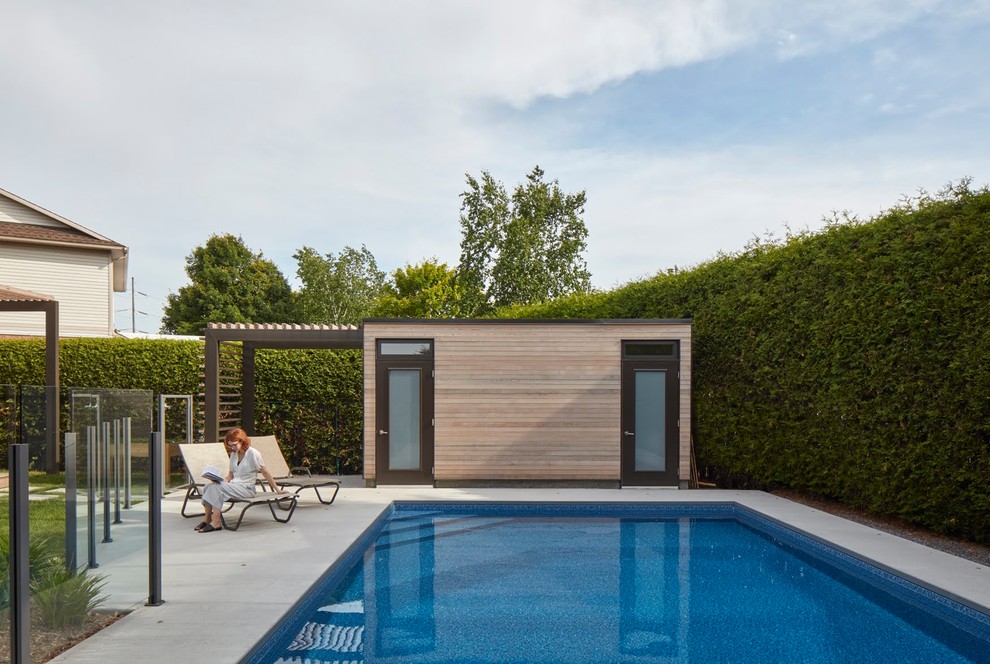Inspiration for a large transitional backyard rectangular lap pool remodel in Ottawa