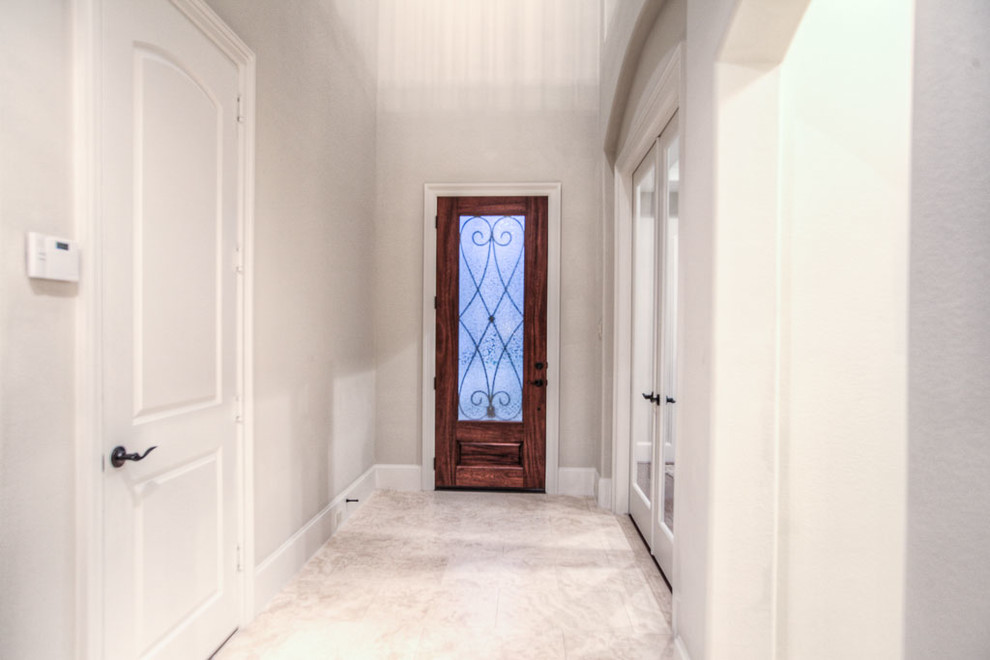 Transitional entryway photo in Houston
