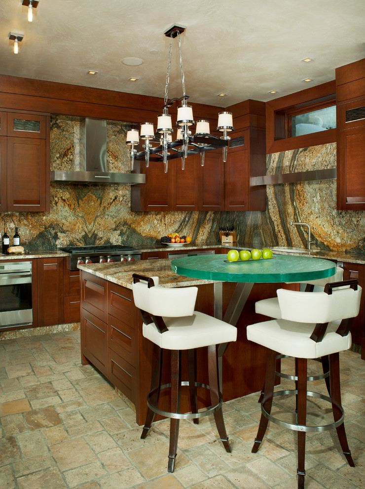 Country kitchen in Denver with dark wood cabinets, multi-coloured splashback, stone slab splashback and with island.