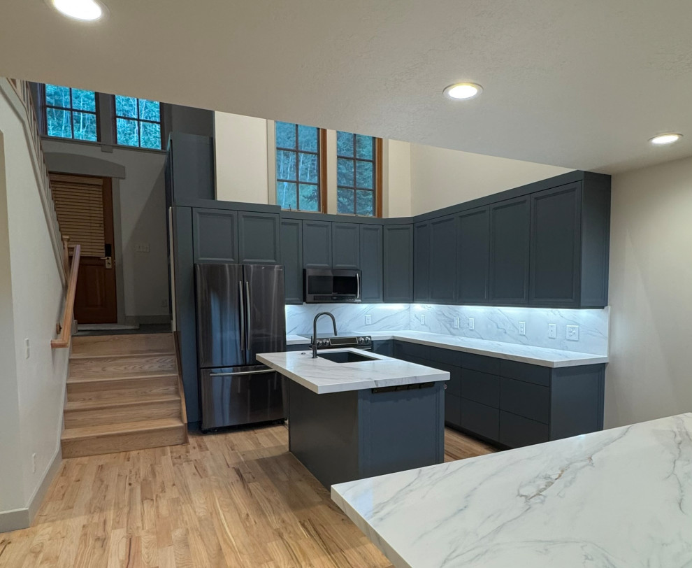 Custom kitchen cabinets, matching countertops, island, back splash, new custom t
