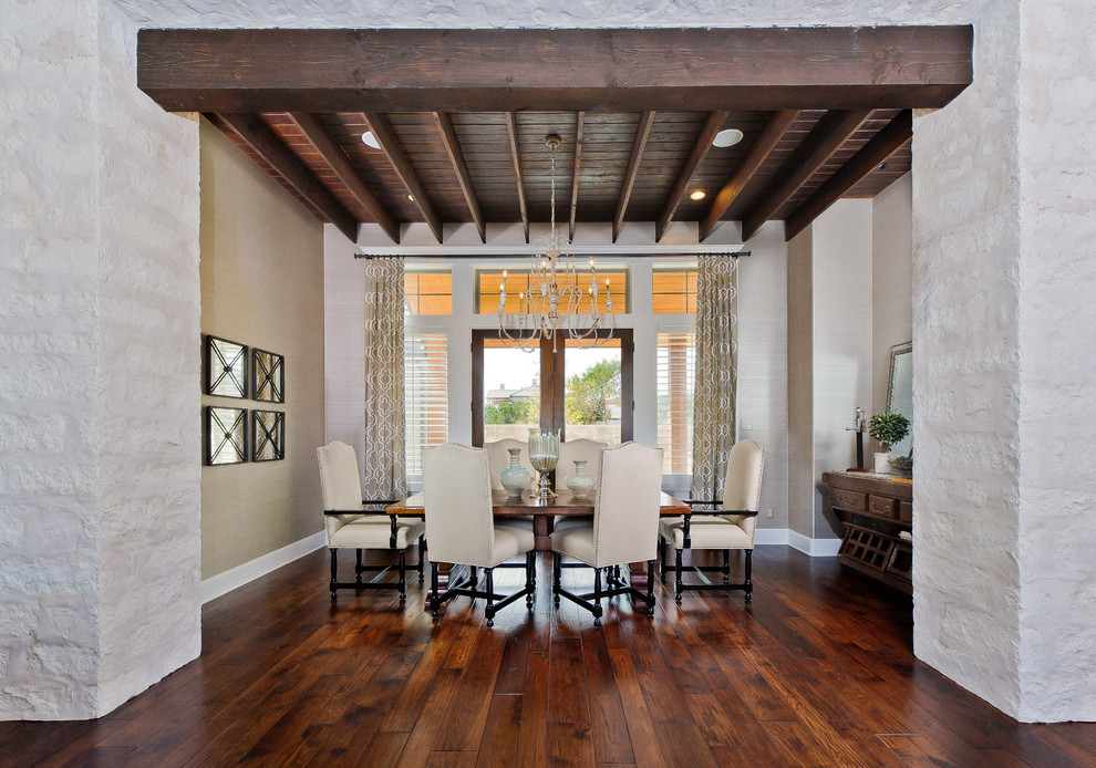 Photo of a contemporary dining room in Austin with beige walls and dark hardwood floors.