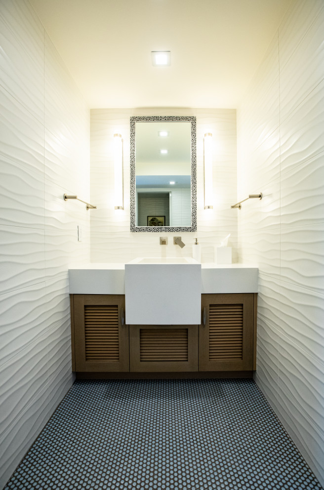 Photo of a large contemporary 3/4 bathroom in Salt Lake City with beaded inset cabinets, light wood cabinets, a shower/bathtub combo, white tile, ceramic tile, white walls, mosaic tile floors, an integrated sink, quartzite benchtops, orange floor, a sliding shower screen, white benchtops, a single vanity and a built-in vanity.