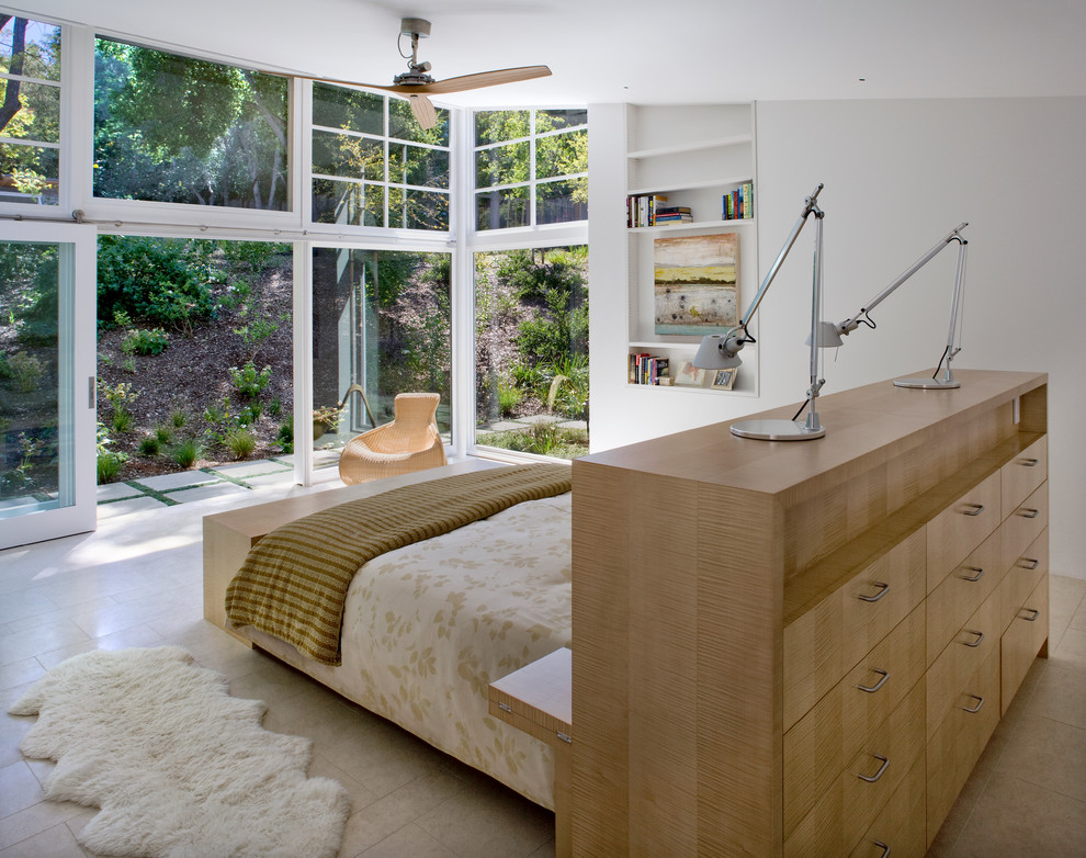 Contemporary master bedroom in San Francisco with white walls.