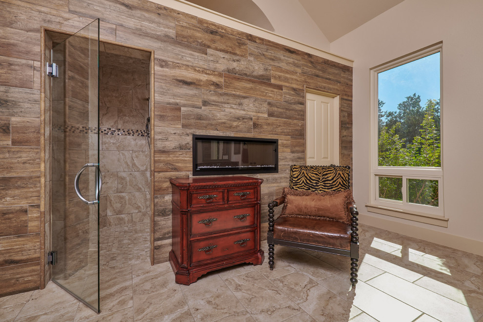 Photo of a large transitional master bathroom in Other with beaded inset cabinets, beige cabinets, a curbless shower, a two-piece toilet, beige tile, ceramic tile, beige walls, porcelain floors, an undermount sink, granite benchtops, beige floor, a hinged shower door and brown benchtops.