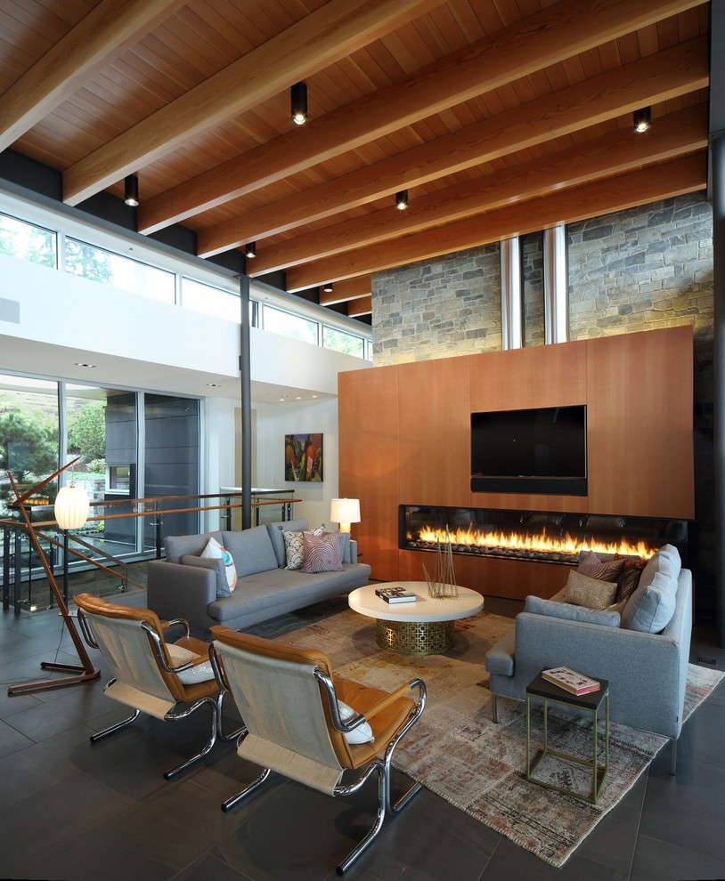Photo of a mid-sized contemporary formal open concept living room in Vancouver with white walls, a built-in media wall and a ribbon fireplace.