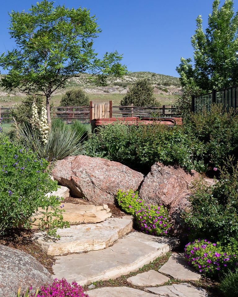 Inspiration for a rustic landscaping in Denver.