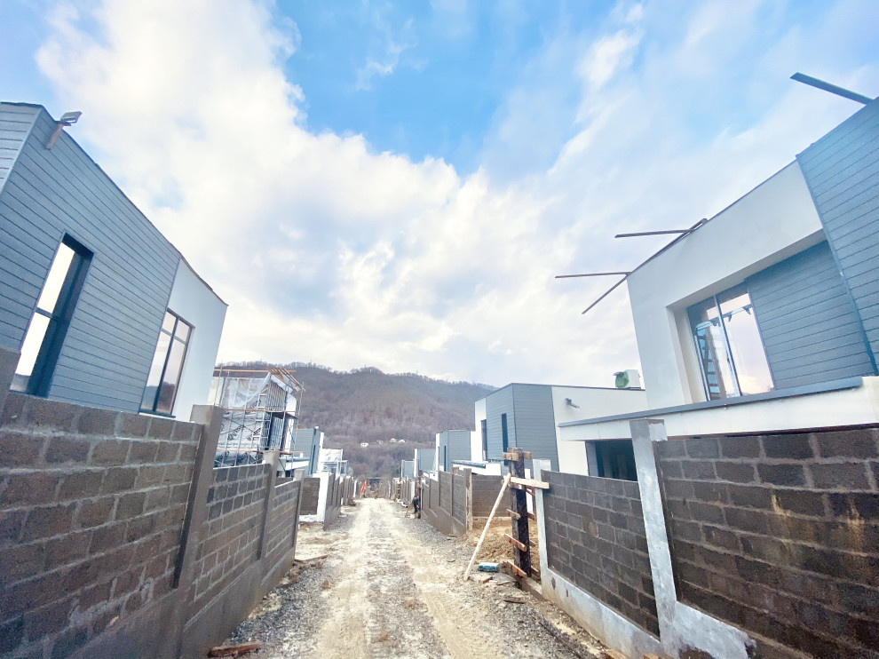 Отделка фасадов коттеджного поселка