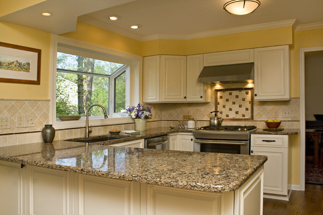 Sunny Tuscan Inspired Kitchen With Beautiful Bronze Accents