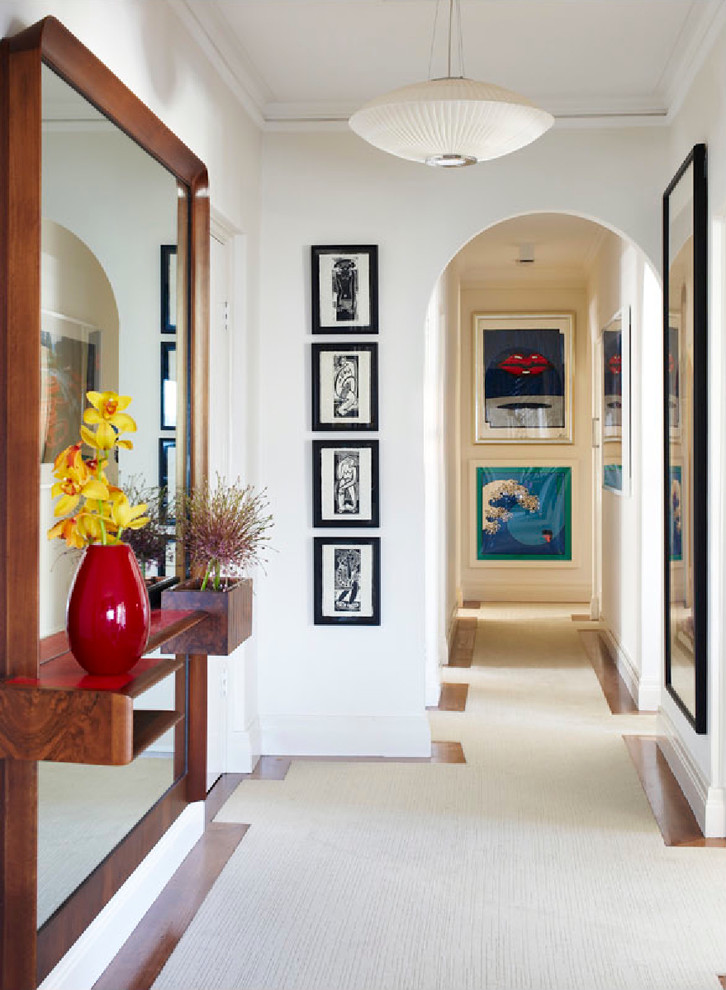 Inspiration for a contemporary entryway in Sydney with white walls.