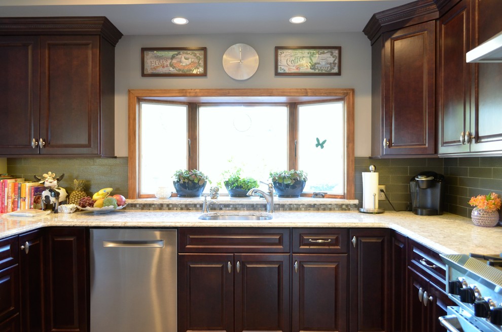 Example of a transitional kitchen design in New York
