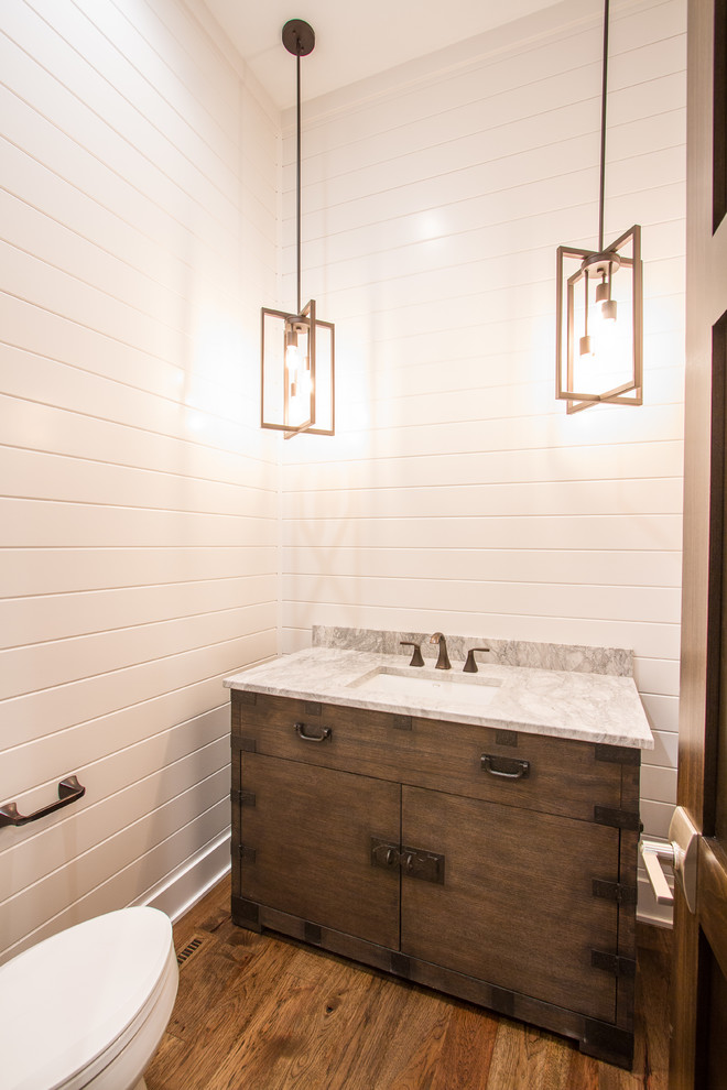 Inspiration for a small transitional 3/4 bathroom in Omaha with furniture-like cabinets, dark wood cabinets, a two-piece toilet, white walls, dark hardwood floors and an undermount sink.