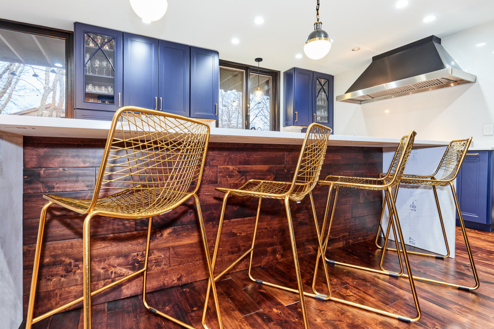 Gold Wire Barstools in a Rich Navy Kitchen