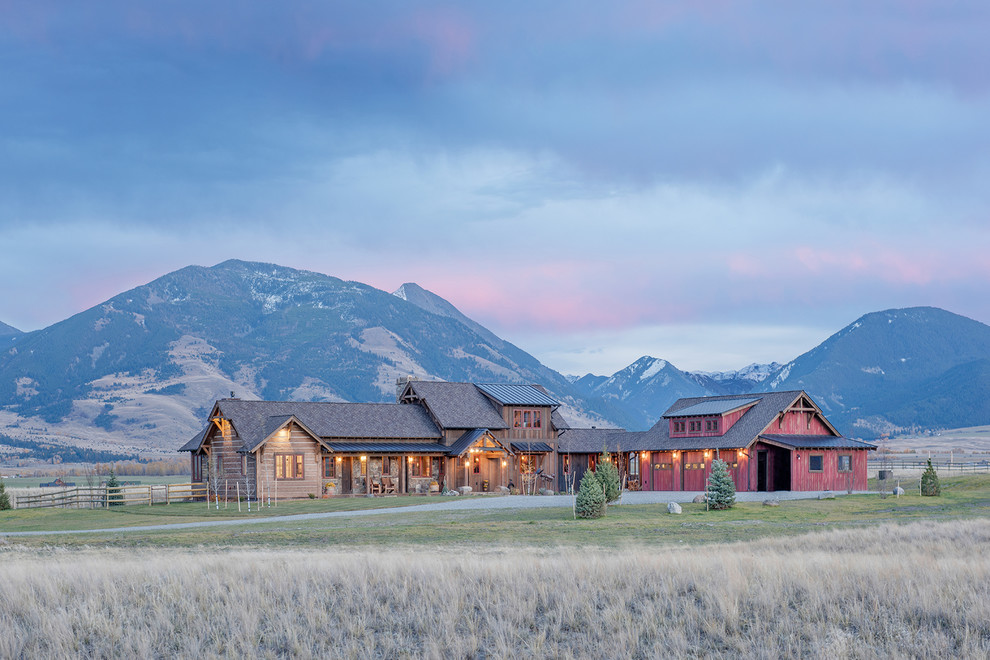 Inspiration for a rustic multicolored mixed siding gable roof remodel with a tile roof